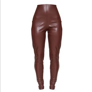 Pretty Little Thing’s Brown Faux Leather Leggings